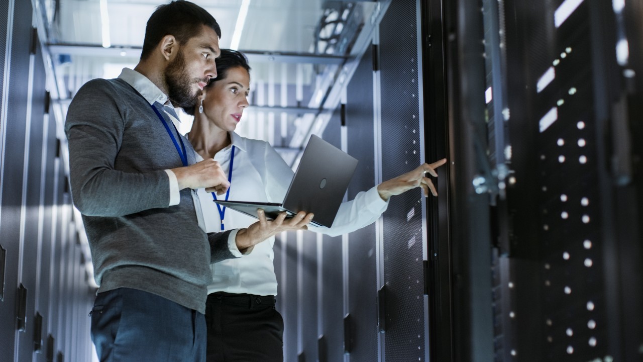 Engineers working inside a technical environment